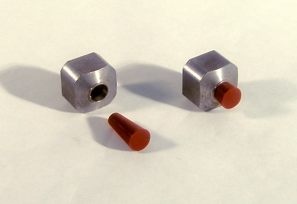 Tapered plug and part for powder coating masking