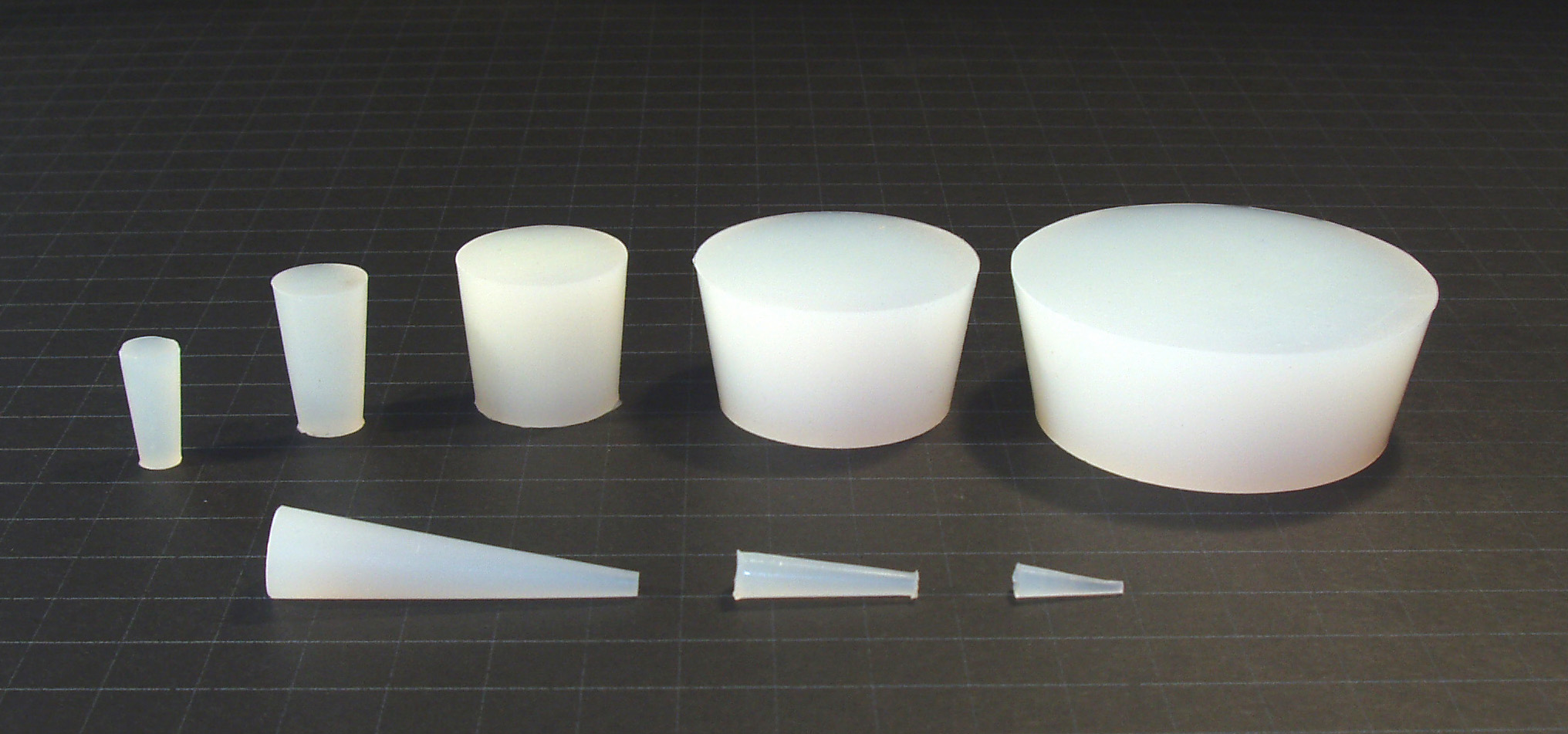 Silicone rubber plugs for anodizing masking